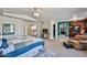 Large primary suite with a second story landing, walk-in closet, and ensuite bath at 22521 N 60Th Ave, Glendale, AZ 85310