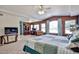 Spacious primary suite featuring a bedroom, office and sitting area at 22521 N 60Th Ave, Glendale, AZ 85310