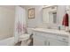 Cozy bathroom with shower tub combo and vanity at 2348 W Comstock Dr, Chandler, AZ 85224