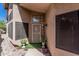 Stylish front entrance with security door, planters and pavers, creating a welcoming entryway at 2348 W Comstock Dr, Chandler, AZ 85224