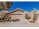 Charming single-story home featuring a tile roof, two-car garage, and low-maintenance landscaping at 2348 W Comstock Dr, Chandler, AZ 85224