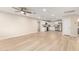 The open-concept living area with an adjacent white kitchen offers plenty of space at 2356 W Catalina Ave, Mesa, AZ 85202