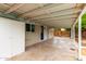 Covered back patio with a large concrete pad perfect for entertaining at 2356 W Catalina Ave, Mesa, AZ 85202