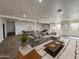 Finished basement rec room complete with projector screen, bar, and ample seating for entertainment at 2904 W Belmont Ave, Phoenix, AZ 85051