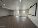 Unfurnished basement space featuring tile flooring, recessed lighting, and windows providing natural light at 2904 W Belmont Ave, Phoenix, AZ 85051