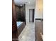 Bathroom featuring granite counters, double vanity, a soaking tub, and tiled shower at 2904 W Belmont Ave, Phoenix, AZ 85051