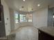 Dining area with chandelier and bay window at 2904 W Belmont Ave, Phoenix, AZ 85051