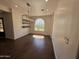 Bright dining room featuring hardwood floors and modern chandelier at 2904 W Belmont Ave, Phoenix, AZ 85051
