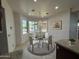 Cozy dining area with chandelier and bay window at 2904 W Belmont Ave, Phoenix, AZ 85051