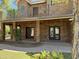 Charming brick house with a beautiful patio and walkway surrounded by lush greenery at 2904 W Belmont Ave, Phoenix, AZ 85051