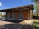 Metal garage structure with covered parking, showcasing a practical outdoor building under a clear sky at 2904 W Belmont Ave, Phoenix, AZ 85051