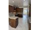 Gourmet kitchen equipped with granite countertops, stainless steel appliances, and custom wood cabinetry at 2904 W Belmont Ave, Phoenix, AZ 85051