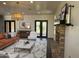 Inviting living room featuring fireplace, plush sofa, and stylish decor at 2904 W Belmont Ave, Phoenix, AZ 85051