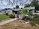 Inviting single-story home with a tidy front yard, desert landscaping, and a charming, gated walkway at 2945 N 19Th Ave # 78, Phoenix, AZ 85015