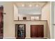 Finished basement features a built-in wine fridge and storage at 3135 W Molly Ln, Phoenix, AZ 85083