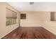 Bright bonus room with hardwood floors, natural light, and a view from the window at 3135 W Molly Ln, Phoenix, AZ 85083