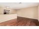 Spacious bonus room featuring hardwood floors and an open layout at 3135 W Molly Ln, Phoenix, AZ 85083