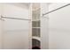 Walk-in closet with custom shelving and hanging rods at 3135 W Molly Ln, Phoenix, AZ 85083