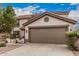 Charming two-story home featuring a large two-car garage and a well-maintained front yard at 3135 W Molly Ln, Phoenix, AZ 85083