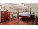 Spacious main bedroom featuring a four poster bed and lots of natural light at 3135 W Molly Ln, Phoenix, AZ 85083