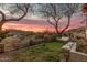 Lush backyard with swing, grass and peaceful desert view at 3201 N 91St St, Mesa, AZ 85207