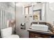 Stylish bathroom featuring custom sink with a tile backsplash, a square sink, and modern fixtures at 3201 N 91St St, Mesa, AZ 85207