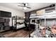 Bedroom featuring bunk beds, a ceiling fan, and vinyl floors at 3201 N 91St St, Mesa, AZ 85207