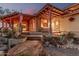 Charming home exterior with a covered porch and desert-style landscaping at 3201 N 91St St, Mesa, AZ 85207