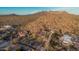 Custom home is nestled in a mountain community with beautiful desert landscaping and neighborhood views at 3201 N 91St St, Mesa, AZ 85207