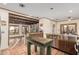 Spacious kitchen featuring stainless steel appliances, custom cabinets, concrete countertops, a center island and open layout at 3201 N 91St St, Mesa, AZ 85207
