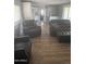 Spacious living room with hardwood floors and comfortable seating for relaxing or entertaining at 3330 E Main St # 332, Mesa, AZ 85213