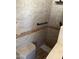 Walk-in shower with a bench and handrail, plus custom tile work at 3330 E Main St # 332, Mesa, AZ 85213