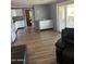 Open floor plan with a view of the kitchen and a slider to the outside at 3330 E Main St # 332, Mesa, AZ 85213