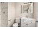 Bathroom featuring a shower, toilet, and vanity with white countertop at 3707 W Elm St, Phoenix, AZ 85019