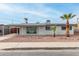 Charming single-story home featuring desert landscaping, a covered parking area, and neutral paint at 3707 W Elm St, Phoenix, AZ 85019
