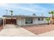 Charming single-story home featuring desert landscaping, a covered parking area, and neutral paint at 3707 W Elm St, Phoenix, AZ 85019