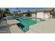 Sparkling pool with cool decking offering a refreshing outdoor oasis at 4129 W Caron St, Phoenix, AZ 85051
