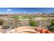Scenic backyard view overlooking a well-maintained golf course, surrounded by desert landscape and beautiful mountain views at 41819 N Anthem Ridge Dr, Phoenix, AZ 85086