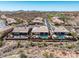 Aerial view features desert homes, golf course and mountains, creating a tranquil community at 41819 N Anthem Ridge Dr, Phoenix, AZ 85086