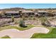 An aerial view of desert homes adjacent to a golf green at 41819 N Anthem Ridge Dr, Phoenix, AZ 85086
