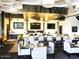 Stylish bar area with modern lighting, comfortable seating, and large screen TVs for a sophisticated experience at 41819 N Anthem Ridge Dr, Phoenix, AZ 85086