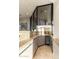 Stylish bar area boasting stone countertops, wine storage, and ample natural light at 41823 N 111Th Pl, Scottsdale, AZ 85262