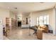 Spacious bedroom with travertine floors, built-in shelves, and natural light at 41823 N 111Th Pl, Scottsdale, AZ 85262