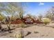 View of Desert Mountain community sign, showcasing desert landscaping and the beauty of the area at 41823 N 111Th Pl, Scottsdale, AZ 85262