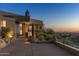 A desert home exterior with desert landscaping, offering both privacy and curb appeal at 41823 N 111Th Pl, Scottsdale, AZ 85262