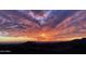 Breathtaking sunset views over desert mountains, showcasing the home's stunning location at 41823 N 111Th Pl, Scottsdale, AZ 85262