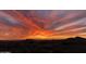 Picturesque sunset over a custom home with amazing skyline views at 41823 N 111Th Pl, Scottsdale, AZ 85262