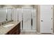 Bathroom featuring granite vanity and enclosed glass shower at 42920 W Kingfisher Dr, Maricopa, AZ 85138