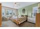 Comfortable bedroom with a large bay window and soft, inviting decor at 42920 W Kingfisher Dr, Maricopa, AZ 85138