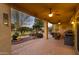 Covered patio offering ample space for outdoor relaxation and dining, ceiling fan, and bbq at 42920 W Kingfisher Dr, Maricopa, AZ 85138